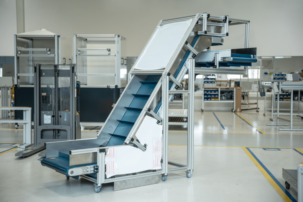 Steigförderer - Z-Förderband mit Stegen